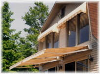 Advanced Awnings Yellow and White Residential Awning